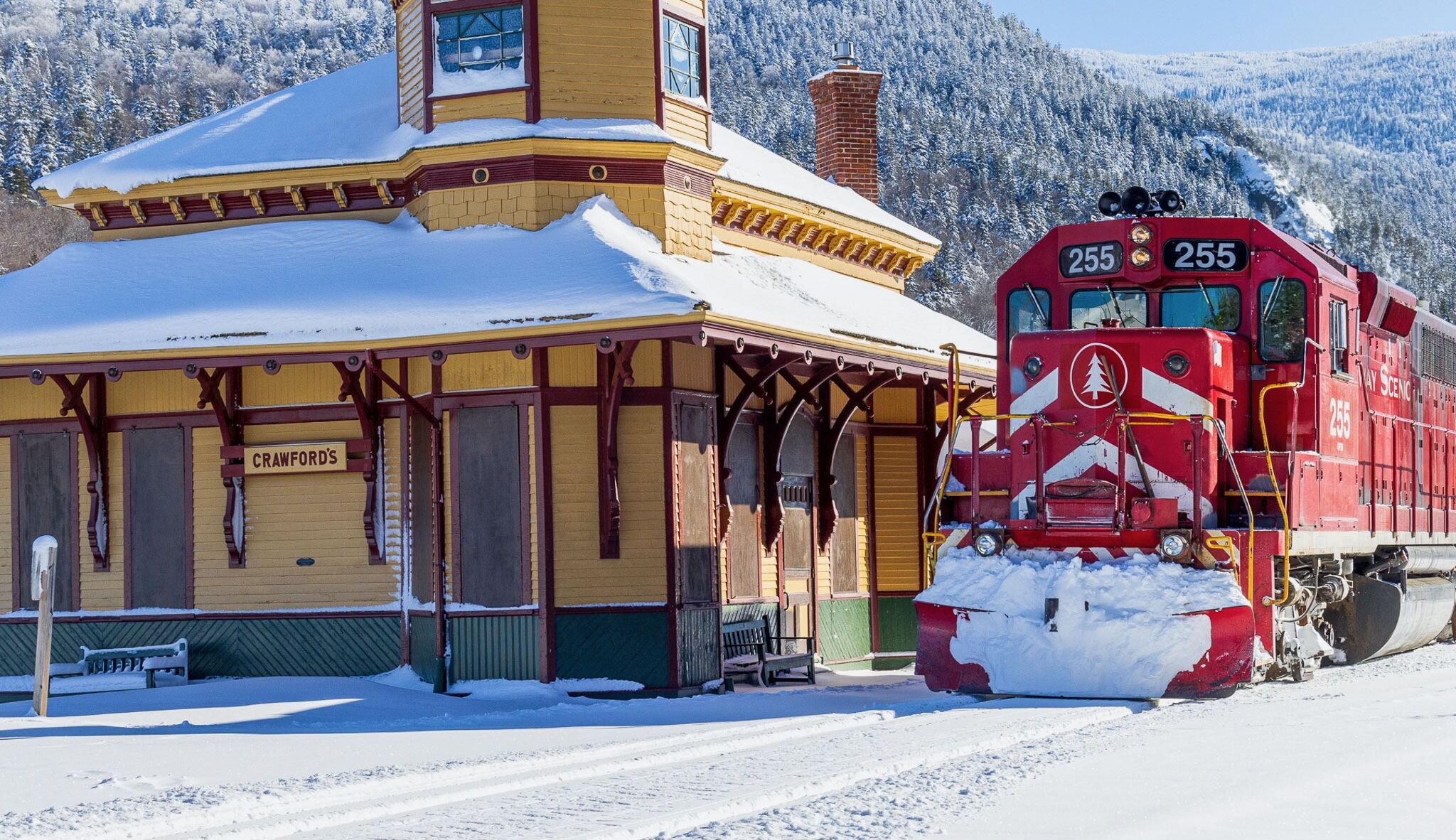 Crawford Depot and red locomotive 255 in winter snow, Crawford Notch, New Hampshire
